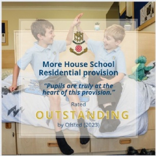 Two boys in school uniforms sit on beds, smiling and high-fiving in a cheerful dormitory room. Text overlay reads: “More House School Residential provision. Rated OUTSTANDING by Ofsted (2023).”.