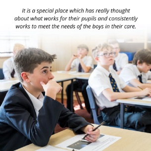 A group of boys in school uniforms sit at desks in a classroom, listening attentively. One boy in the foreground holds a pencil near his mouth. A caption above describes the school's dedication to meeting pupils' needs.