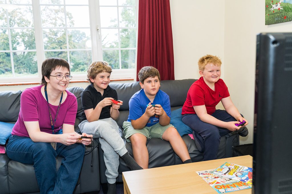 More House School Pupils and staff playing video games