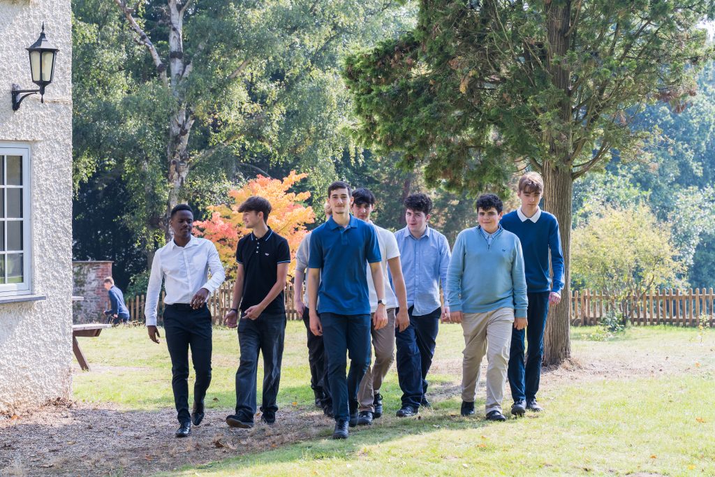 More House School Sixth Form Pupils walking in the school grounds