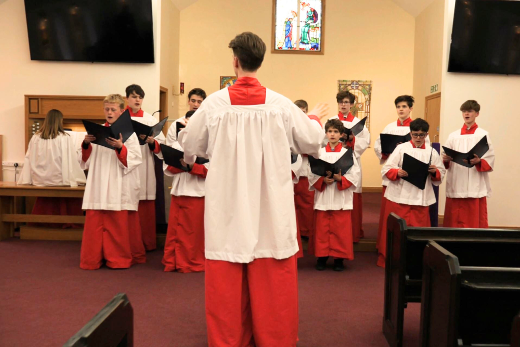 Pupils participating in a chapel choir