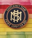 A round Chaplaincy Team badge with MHS school crest and gold lettering reading PRIMO SERVITOR DEI.