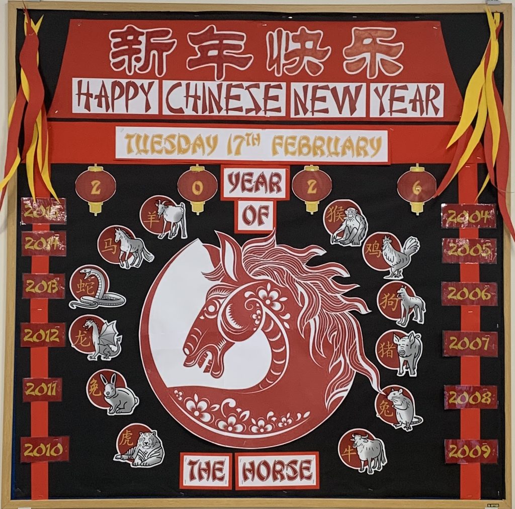 Noticeboard decorated for Chinese New Year, featuring the Year of the Horse, zodiac animals, years, and the date Tuesday 17th February.